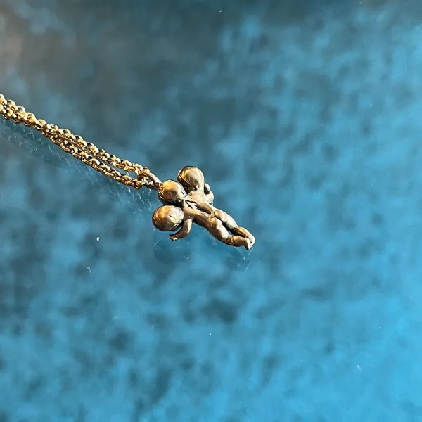 Three Headed Baby Necklace