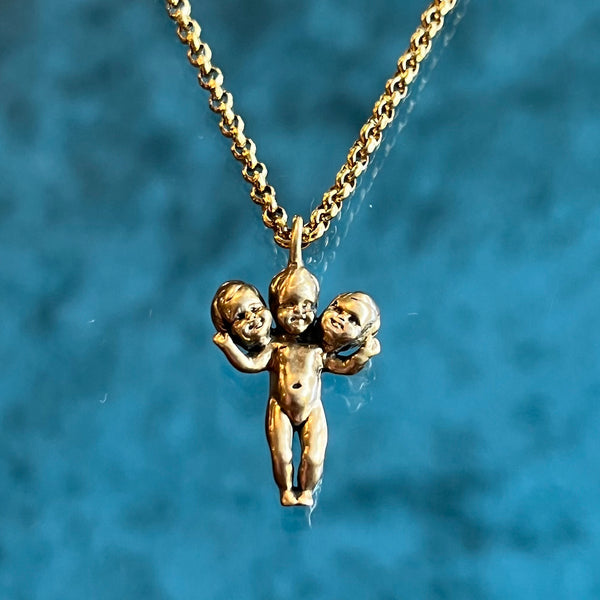 Three Headed Baby Necklace