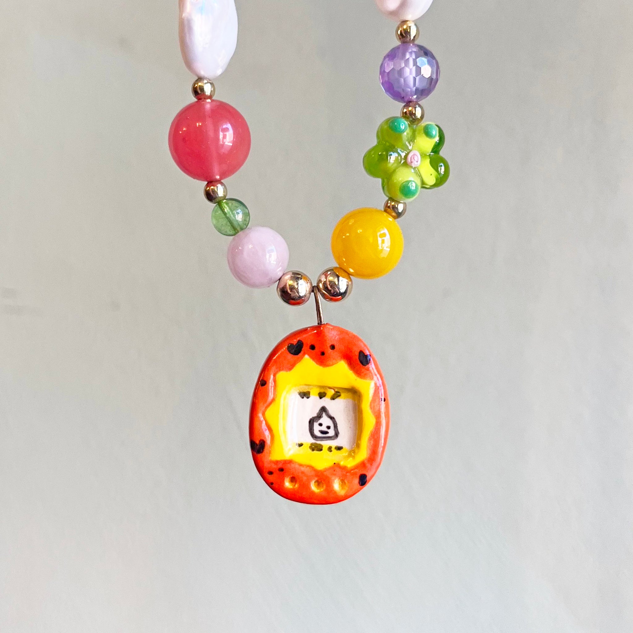 Porcelain Orange Tamagotchi Necklace