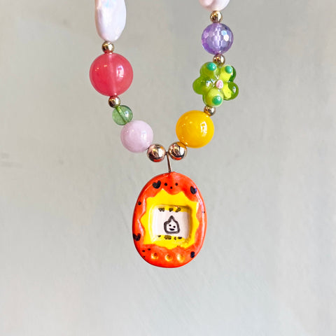 Porcelain Orange Tamagotchi Necklace