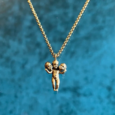 Three Headed Baby Necklace