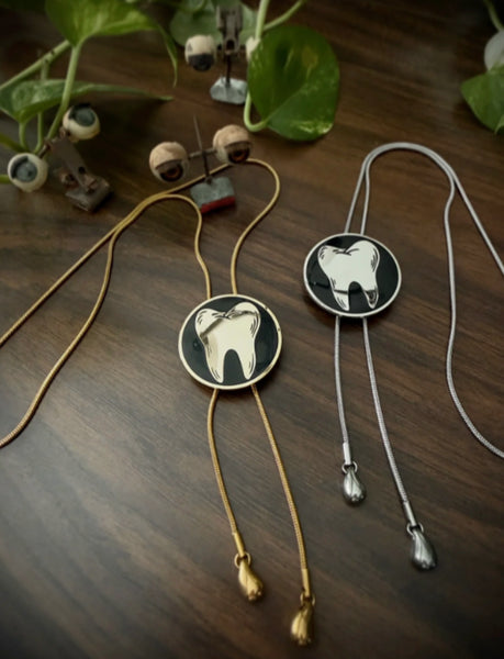 Lucky Tooth Bolo Tie